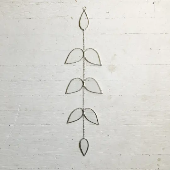 Laurel Suncatcher in Clear Glass, 10% of proceeds go to the ACLU.