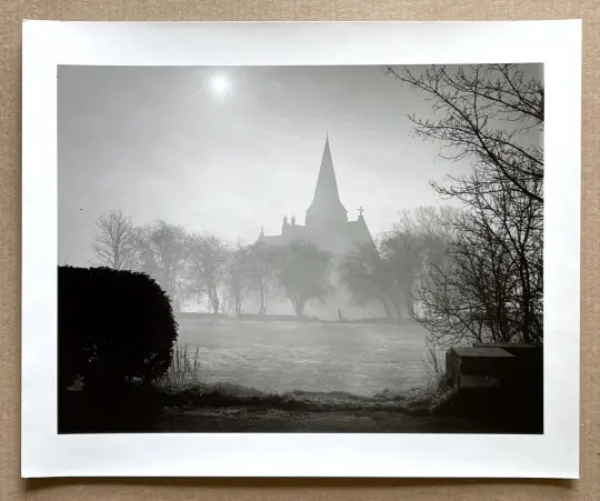 Church in early morning mist.