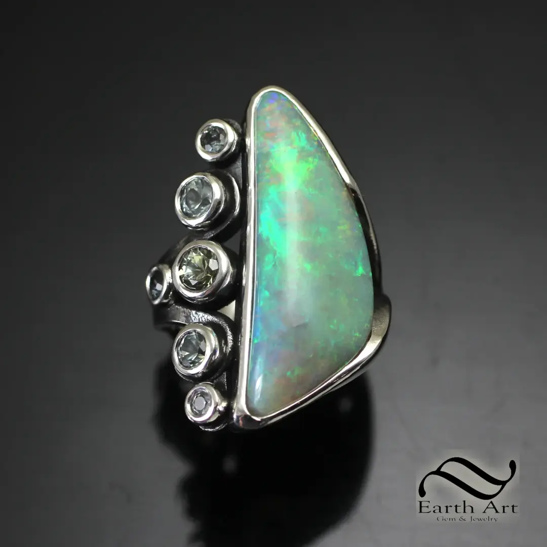 8.3 ct Australian opal Ring with Montana Sapphires