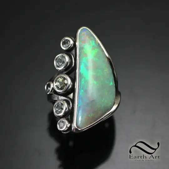 8.3 ct Australian opal Ring with Montana Sapphires