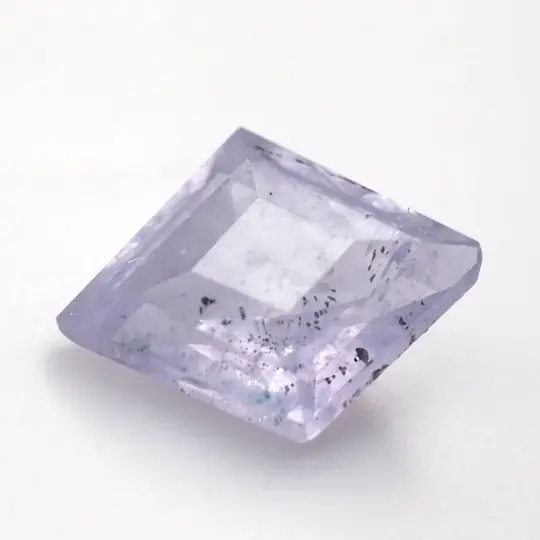 Milky blue sapphire lozenge step cut .33 ct
