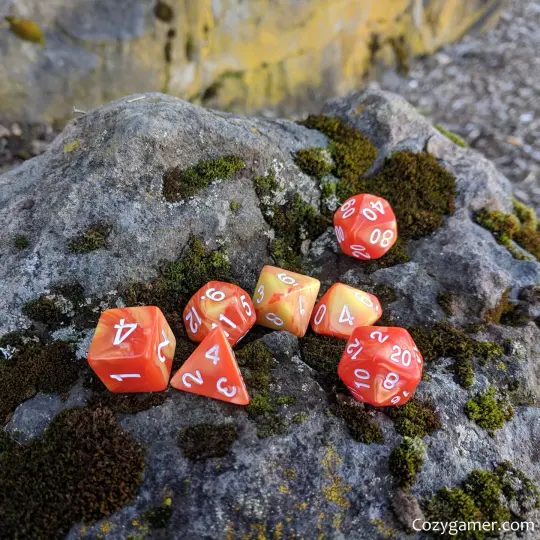 Flaming Orb Dice Set – 7-Piece Orange Yellow Pearl Marbled Acrylic Fire DnD