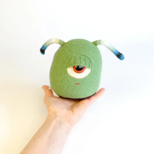 Chuck the green cyclops monster with antennae
