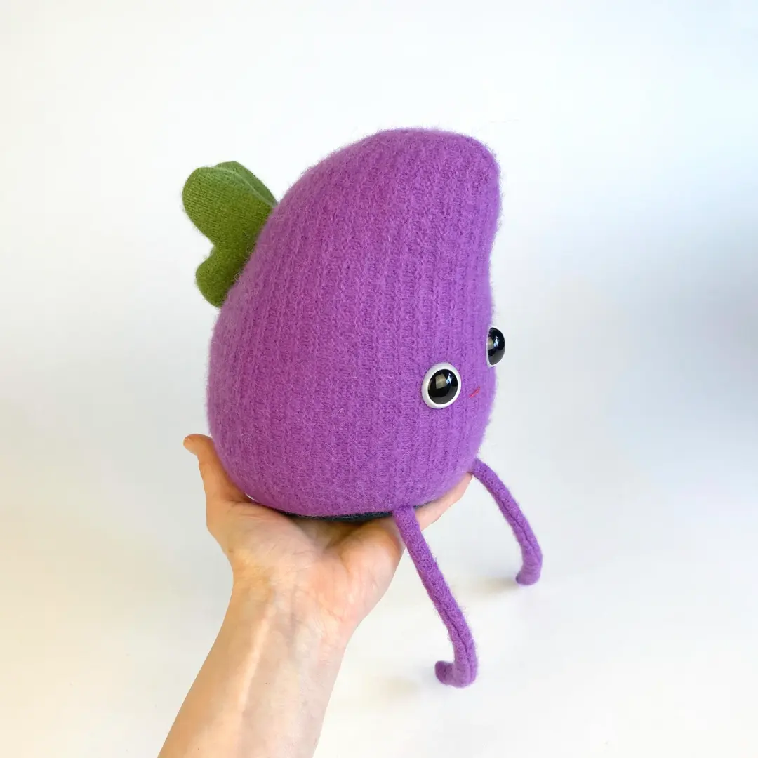 Poppy the plush monster with butterfly wings