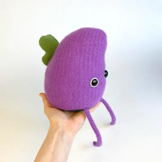 Poppy the plush monster with butterfly wings