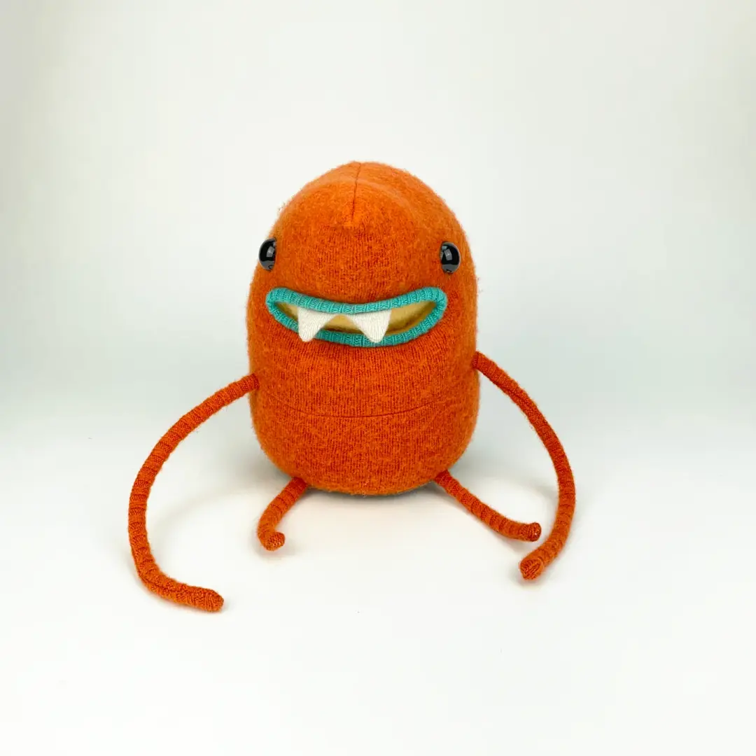 Stu the orange plush my friend monster™ wool sweater stuffy