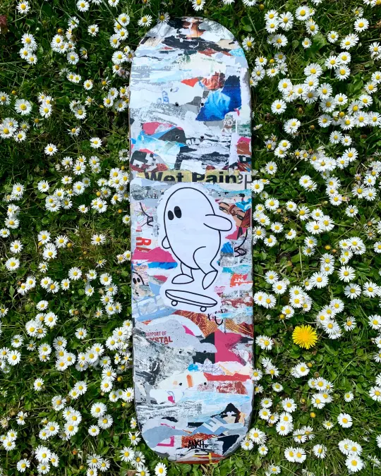 “Skate through the noise.” Recycled Skateboard Art Piece