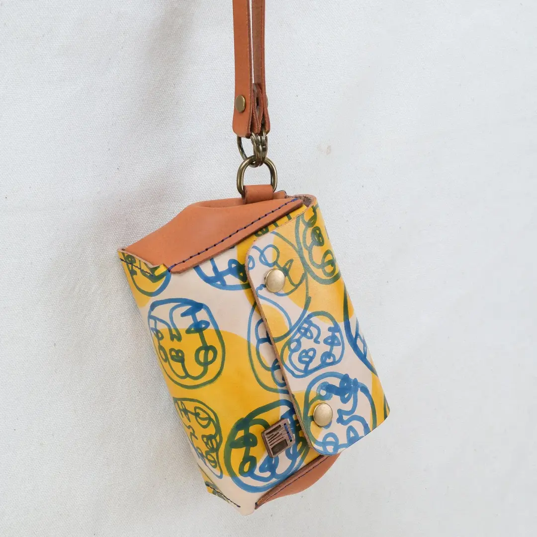 Paint Little Purse Hang blue faces + yellow + tan