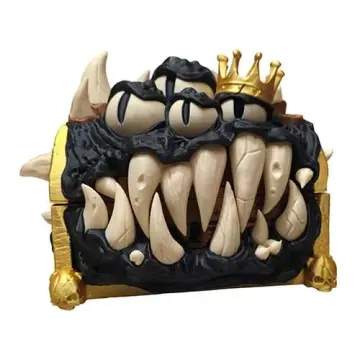 Mimic treasure chest dice box, 3D printed with bone colored fangs, staring eyes, a gold crown and skull feet