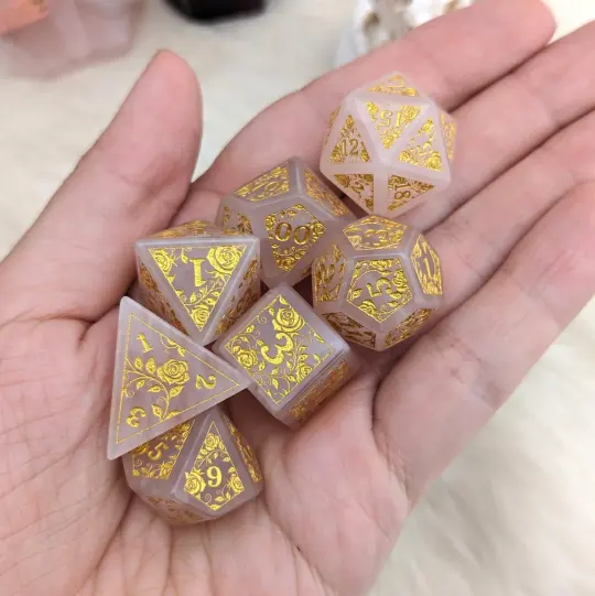 Quartz of Roses Dice Set – 7-Piece Rose Quartz Gold Rose Engraved Gemstone DnD
