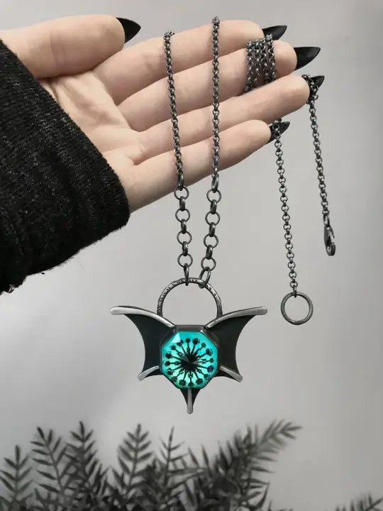 Glowing Blue Quartz Bat Wing Necklace