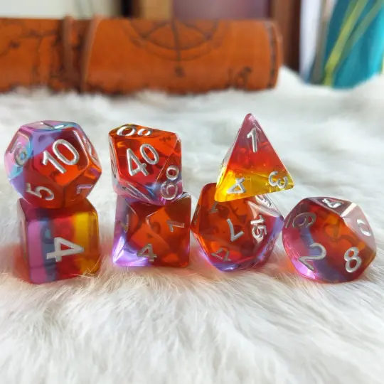 Golden Time Dice Set. Clear Layered Yellow, Red, Purple, and Pink Resin Dice Set