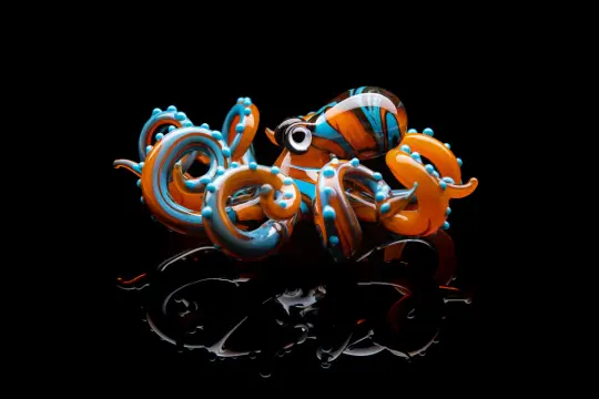 The Orange and turquoise Octopus pendant blown glass octopus necklace