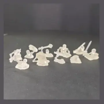 Unpainted 32mm clear resin 3D-printed skeletons clawing out of the earth as summoning markers, tabletop wargame and RPG miniature for D&D, Pathfinder and rank and flank armies