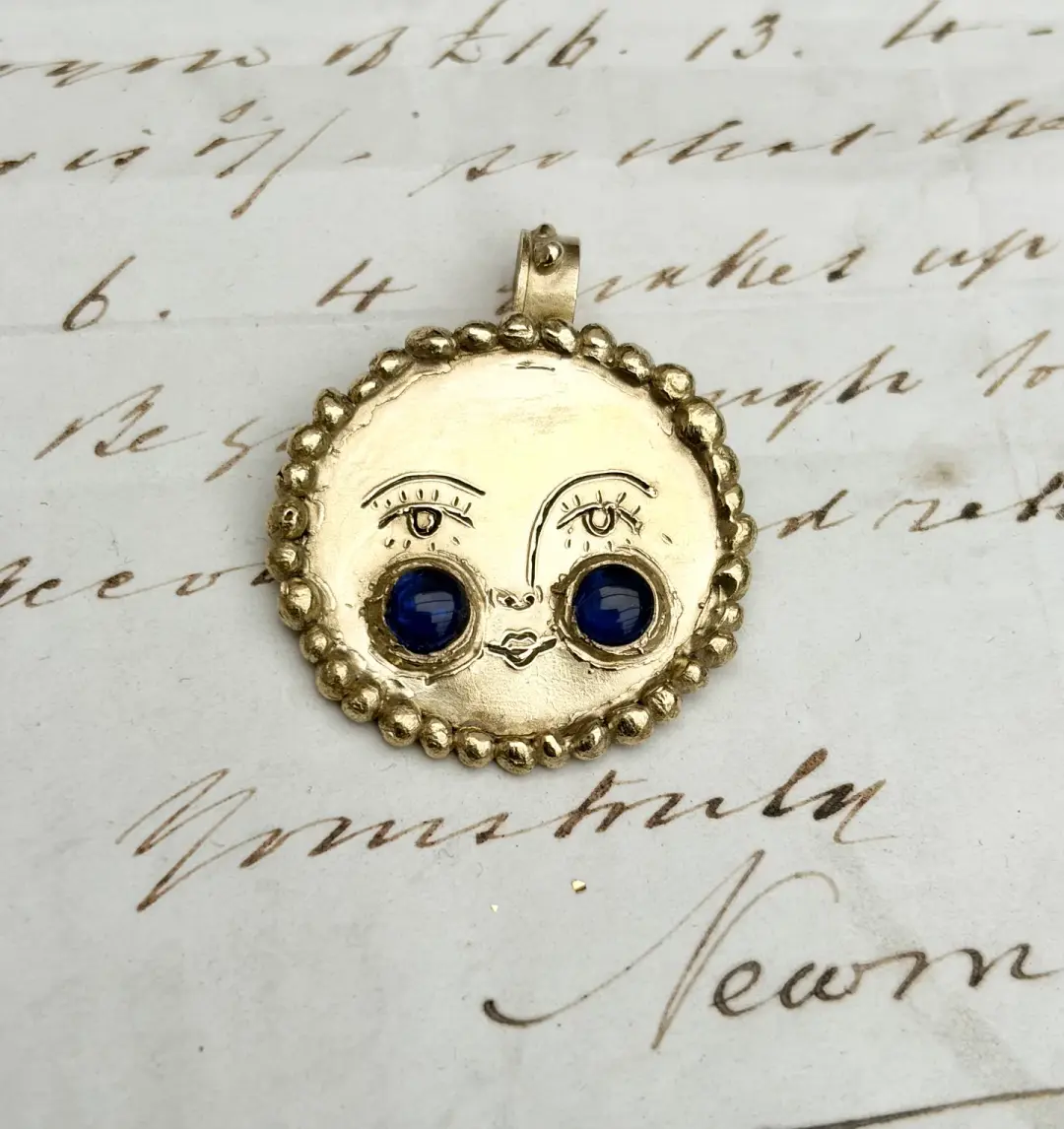 Sun Pendnat with Sapphire Detail