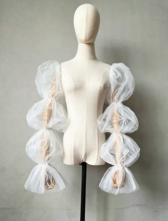 Oversized tulle sleeves