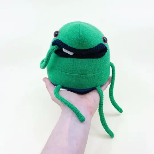 Douglas the plush upcycled wool sweater creature