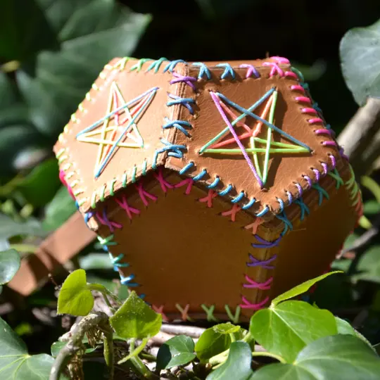 Handmade leather dice bag embroidered with rainbow thread