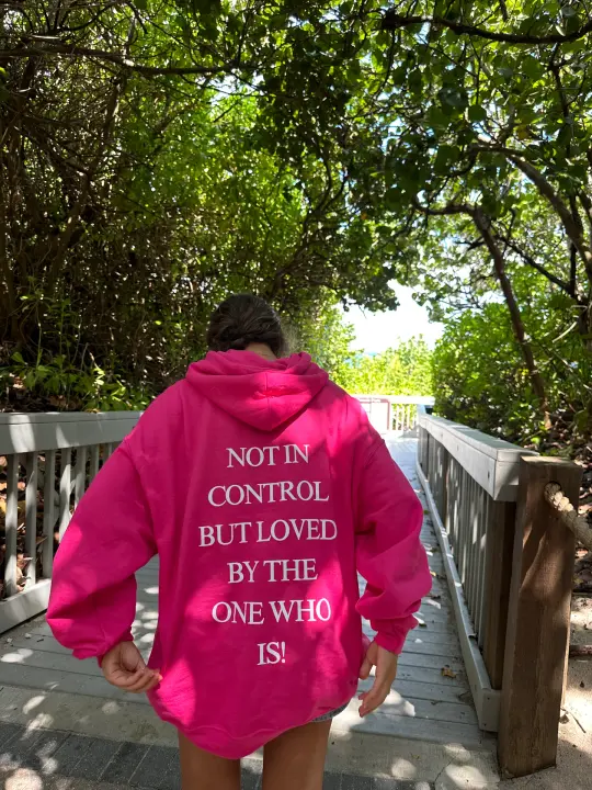 "not in control but loved by the One who is" hoodie