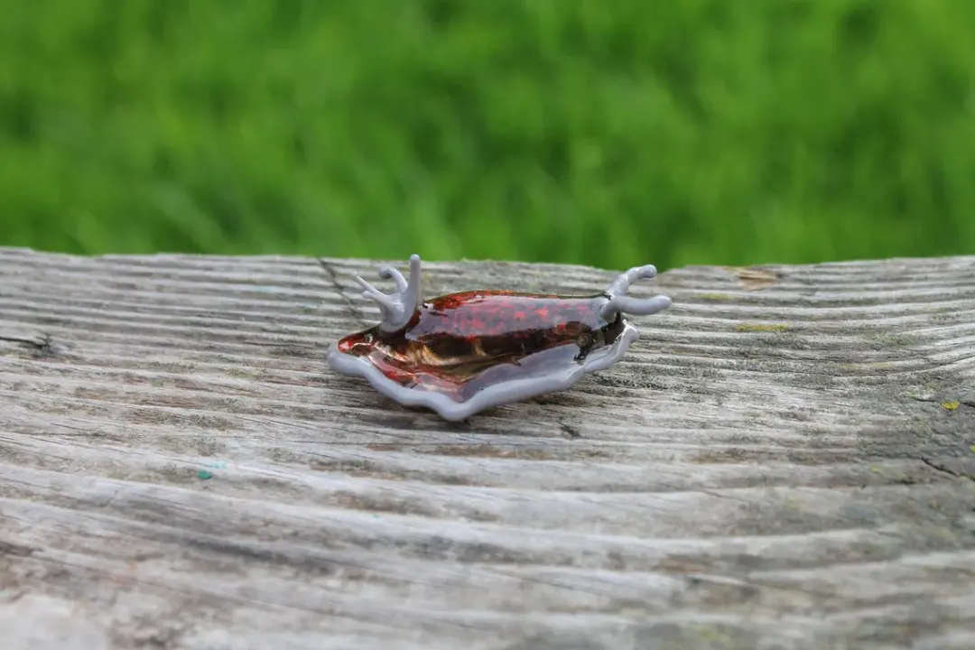 Red And Gray Glass Sea Slug Figurine – Handmade Ocean Art