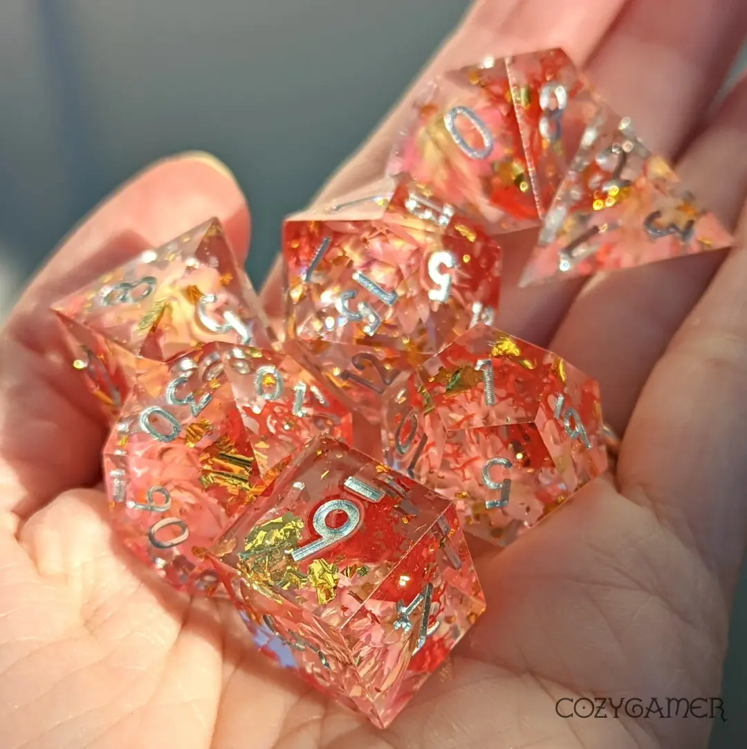 Pink Flowers and Moss Sharp Edge Resin Dice Set. 7 Piece DND dice set with real dried flowers.
