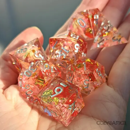 Pink Flowers and Moss Sharp Edge Resin Dice Set. 7 Piece DND dice set with real dried flowers.
