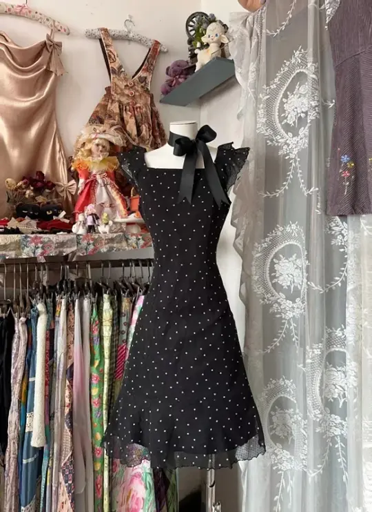 Black halter-neck polka dot A-line short ball gown with a fitted waist R7446