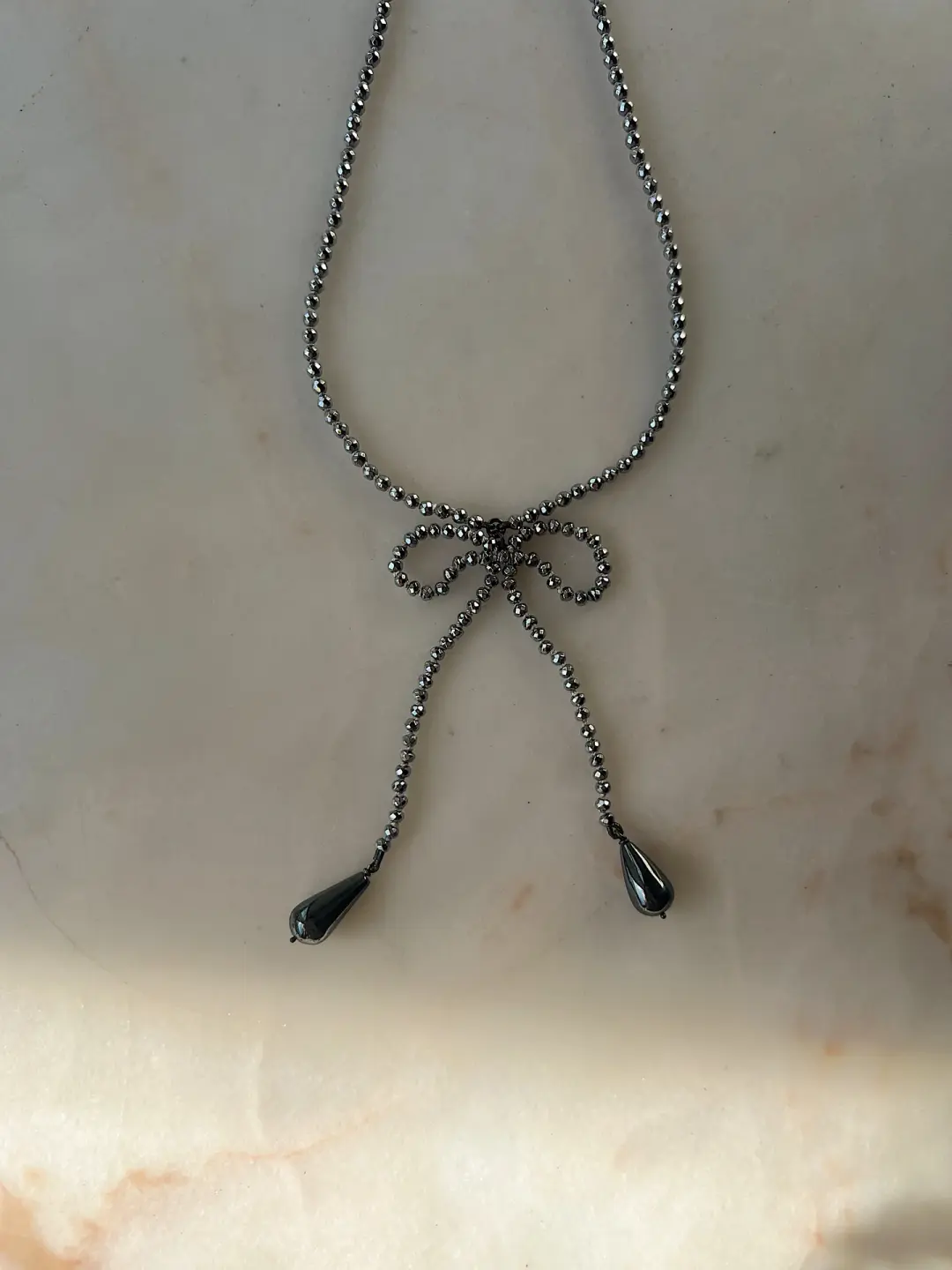 Ribbon Bows III // Hematite Necklace