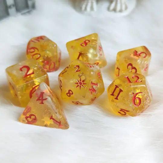 Sunbeam Dice Set – 7 and 11-Piece Gold Celestial DnD Dice with Sun Design | Fennek & Finch