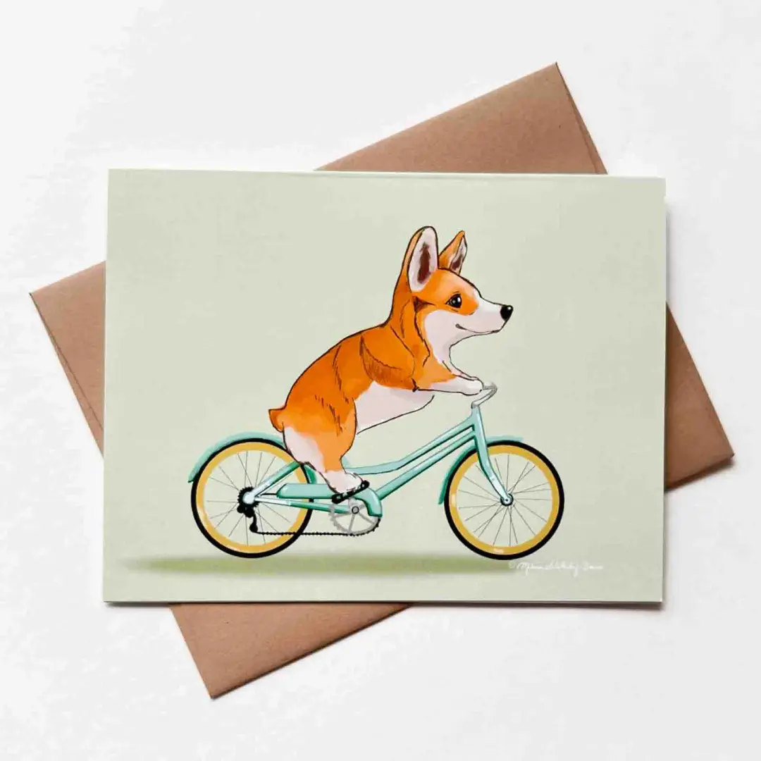 Corgi Riding Bike Greeting Card