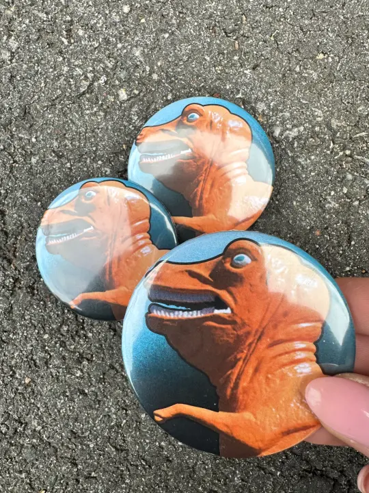 Saugusaurus Orange Dinosaur pin or bottle opener