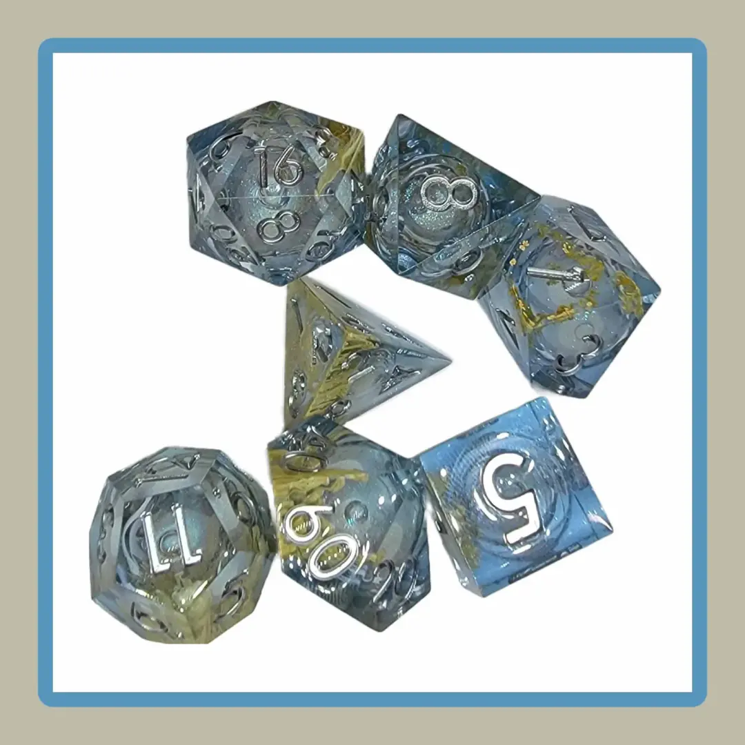 clear rpg dice with yellow splotches and liquid core