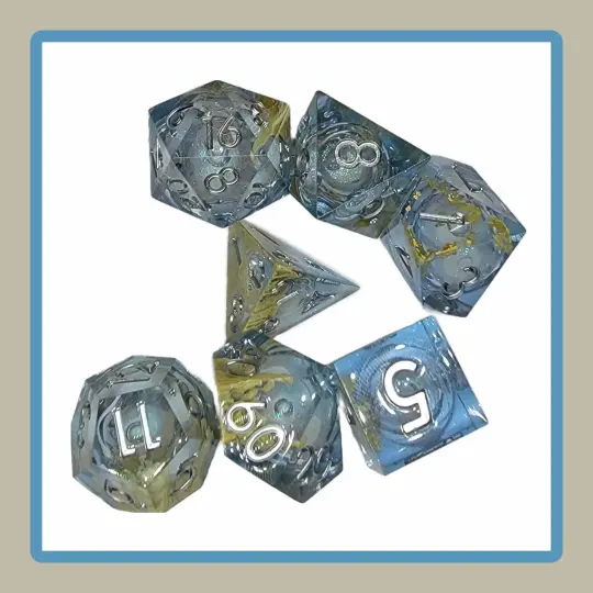 clear rpg dice with yellow splotches and liquid core