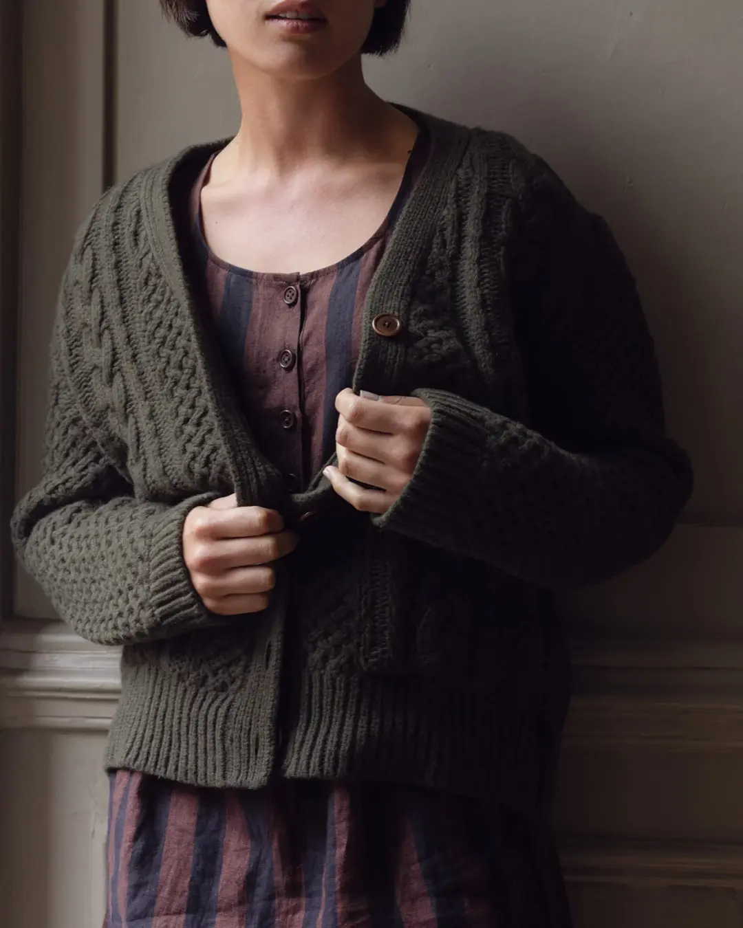 Merino Wool Cable Knit Cardigan with Pockets in Brunswick Green