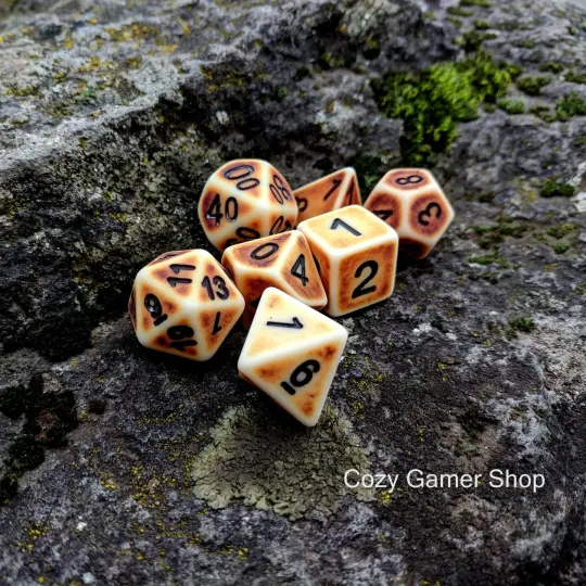 Ancient Bones Dice Set – Faux Bone Resin with Weathered Finish (7-Piece)