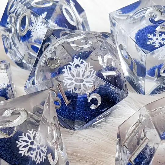 Snowflake Liquid Core Sharp Edge Dice Set – 7-Piece Blue Glitter DnD Dice