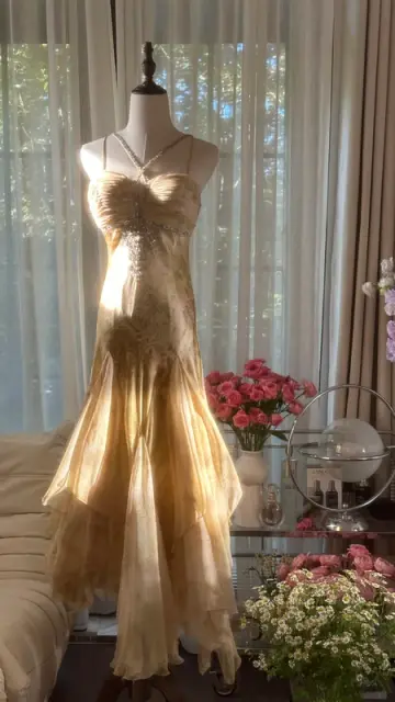 Light brown halter-neck fitted long ball gown with an asymmetrical hem R7763