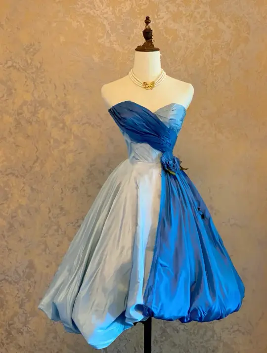 Blue color-block strapless ball gown with a cinched waist and an A-line skirt; bridal gown R7304