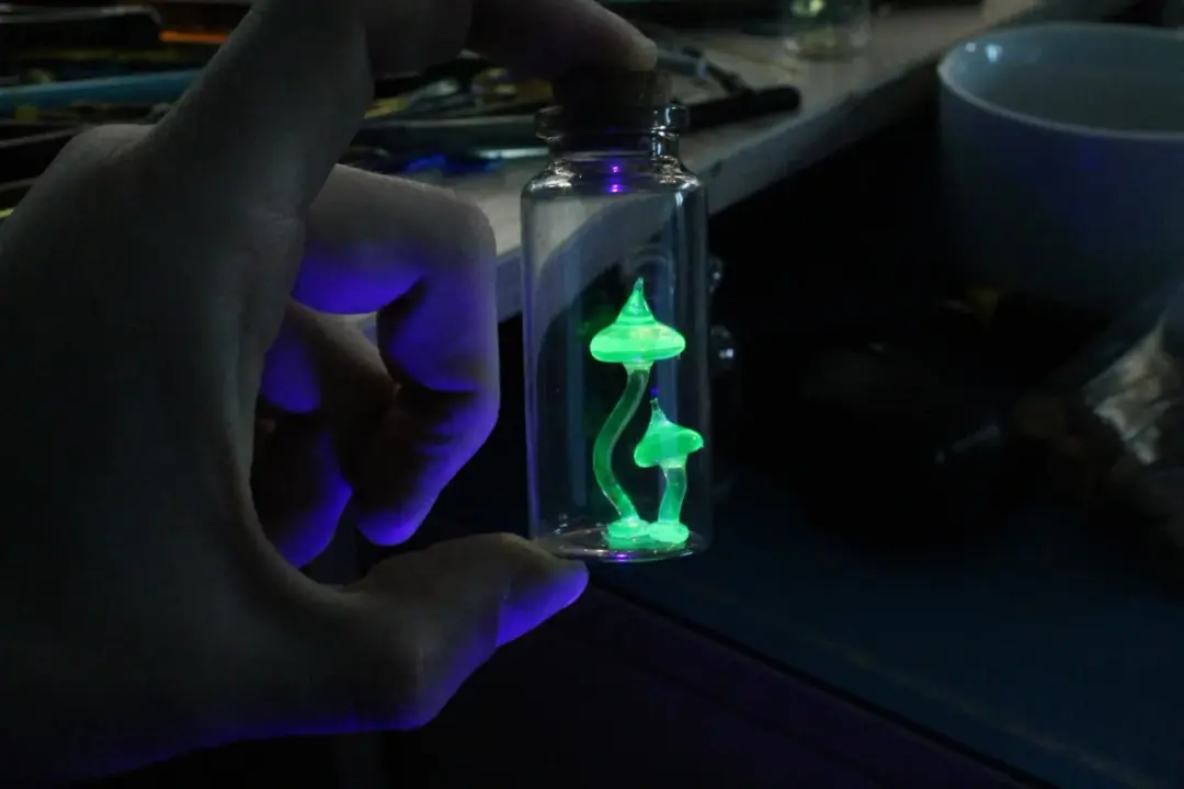 Tiny Uranium Glass Mushrooms Encased in Bottle - Collectible