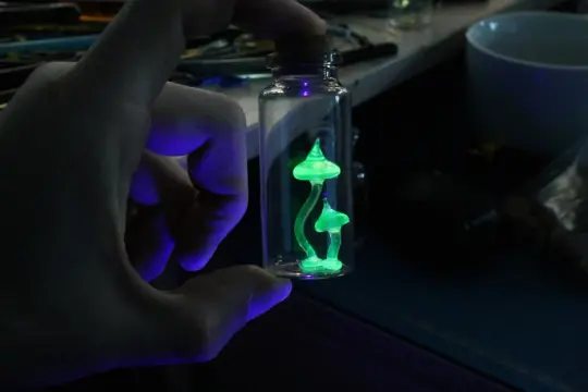 Tiny Uranium Glass Mushrooms Encased in Bottle - Collectible