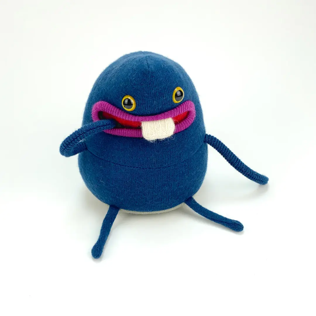 Snort the plush upcycled wool sweater creature