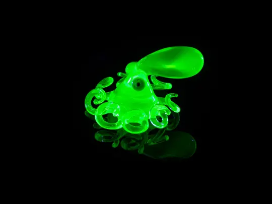 Green Uranium glass octopus figurine glowing green Murano sea creature sculpture UV handmade animal