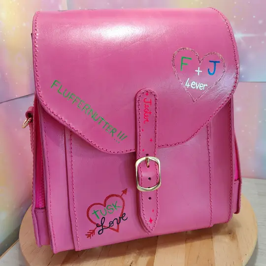 Pink leather backpack inspired by Jester