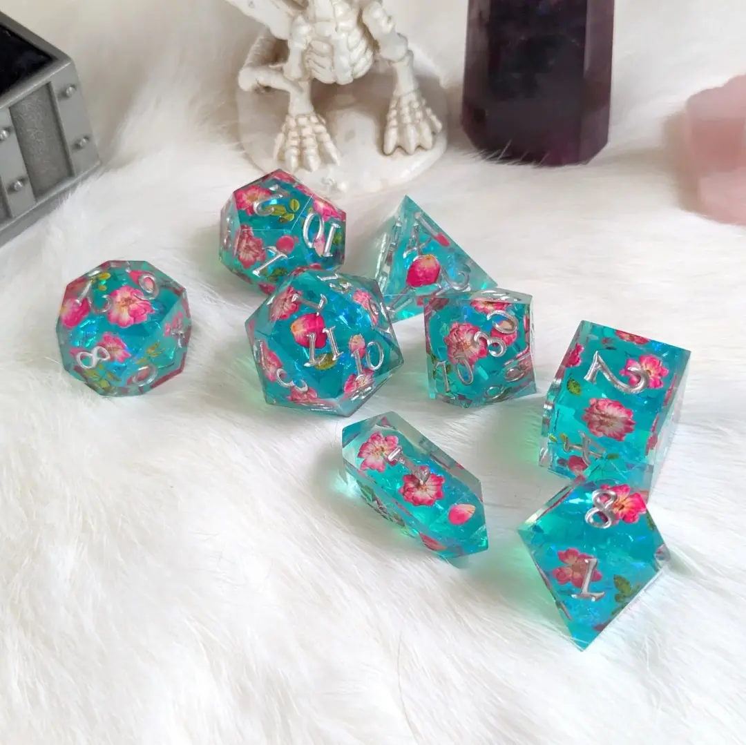 Floating Blossoms Dice Set – 8-Piece Blue Pink Floral DnD Dice with Crystal D4 | Fennek & Finch