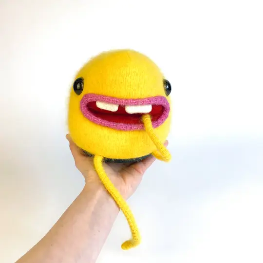 Snookums the fluffy yellow angora monster