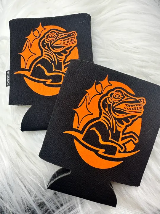 Saugus/Malden orange dinosaur koozies