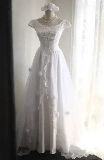 White fitted long ball gown with beaded details exudes elegance R6690