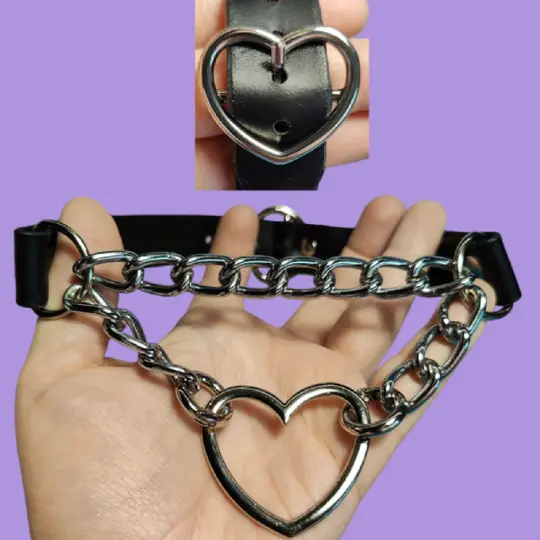Handmade leather choker with a heart on a chain.