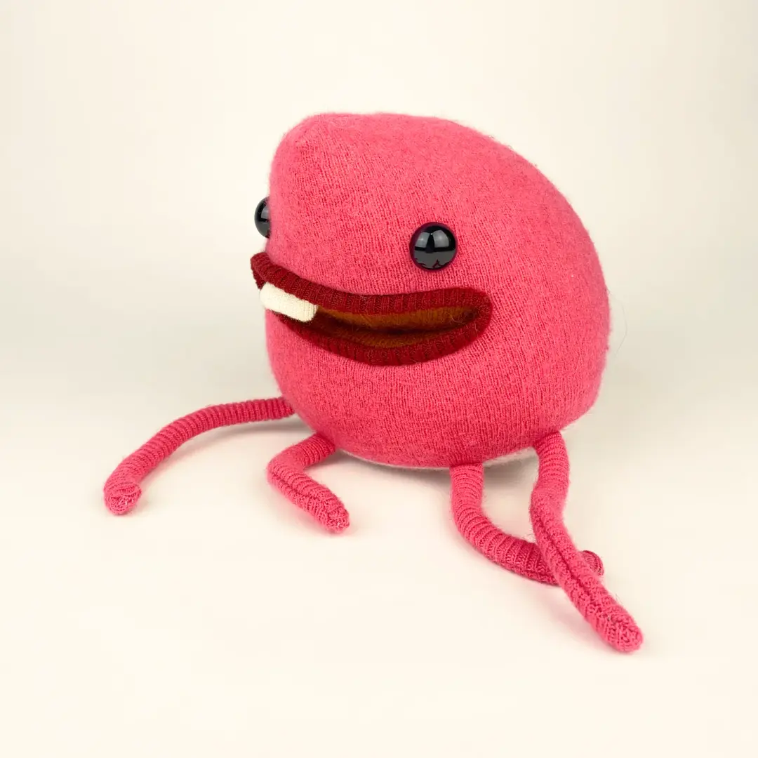 Timmy the pink plush friendly monster