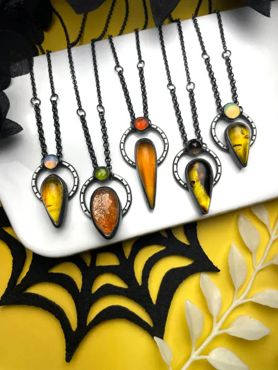 Amber & Sunstone Orbit Necklaces - 3 left: A, D & E
